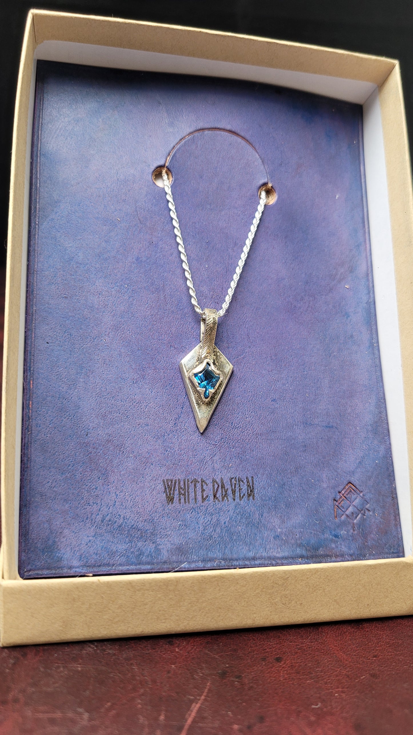 .925 Silver Spear Pendant -blue topaz