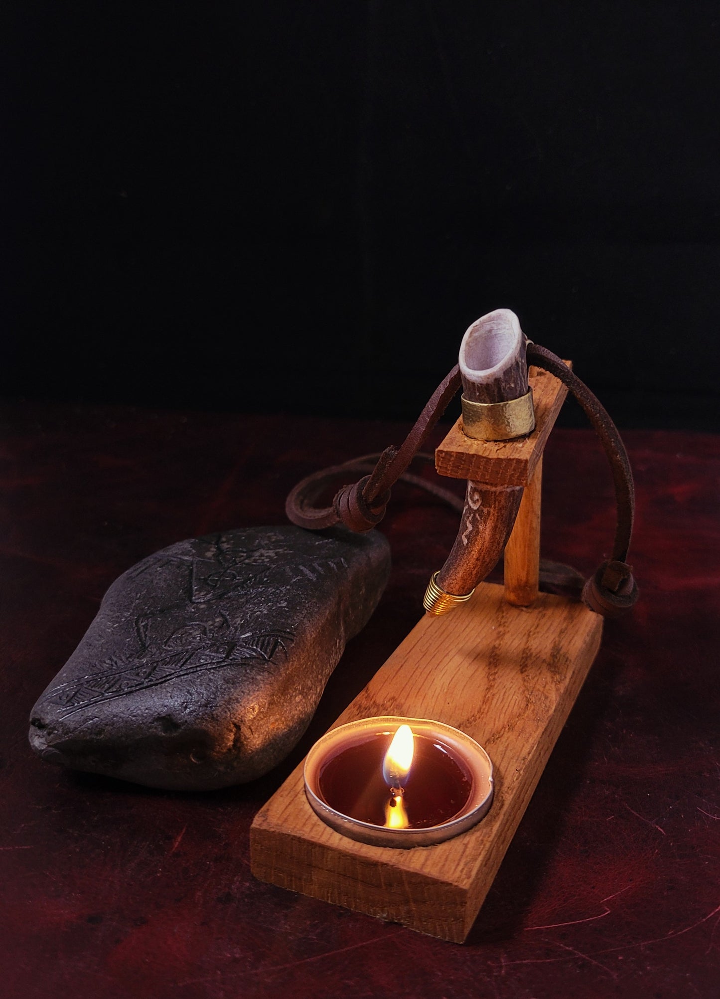 Deer antler drinking horn altar stand