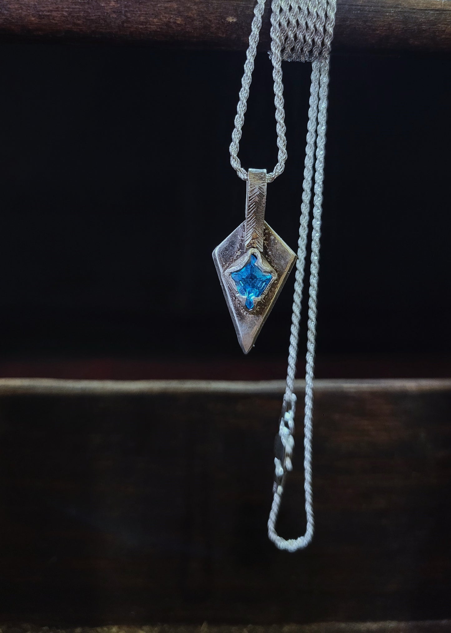 .925 Silver Spear Pendant -blue topaz