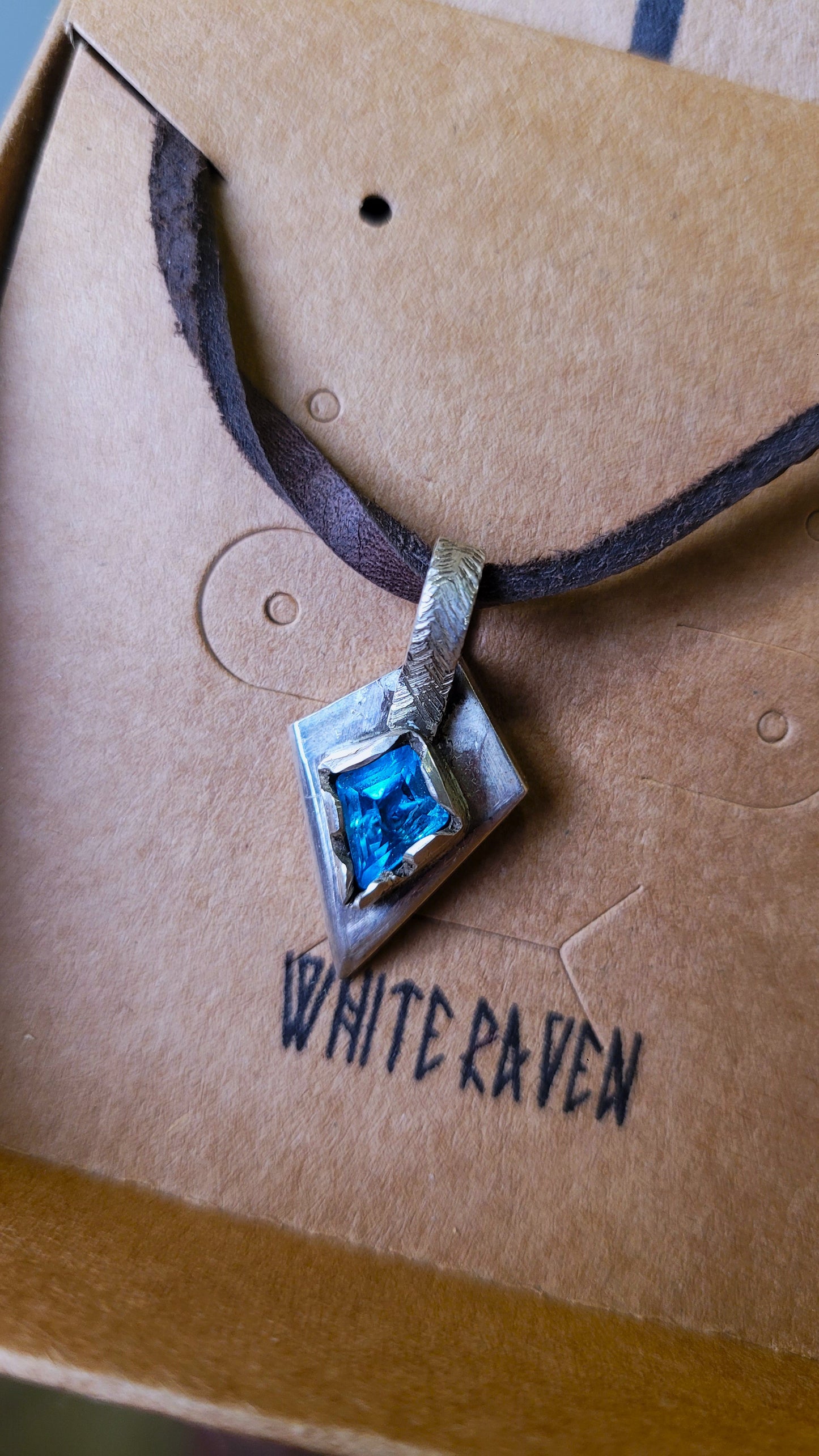 .925 Silver Spear Pendant -blue topaz- leather cord *chipped gem